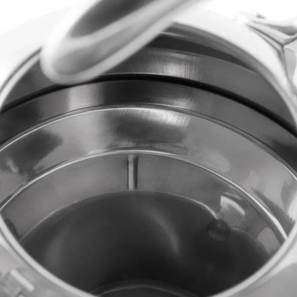 Close-up of a metal container with a lid, possibly a coffee filter basket.