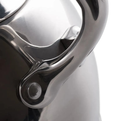 Close-up of a shiny metallic object with reflective surface
